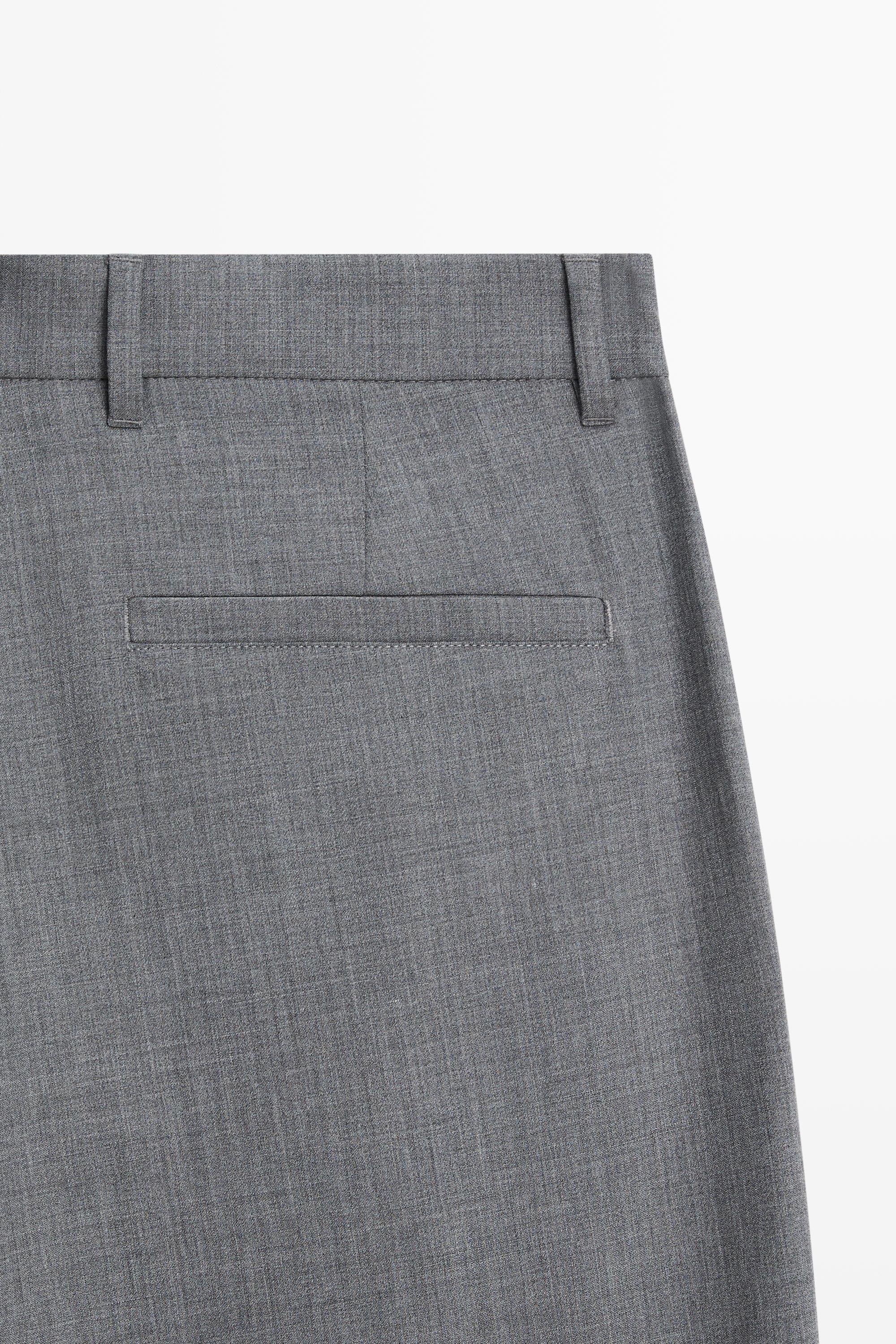 Pantalon relaxed fit à pinces en laine froide